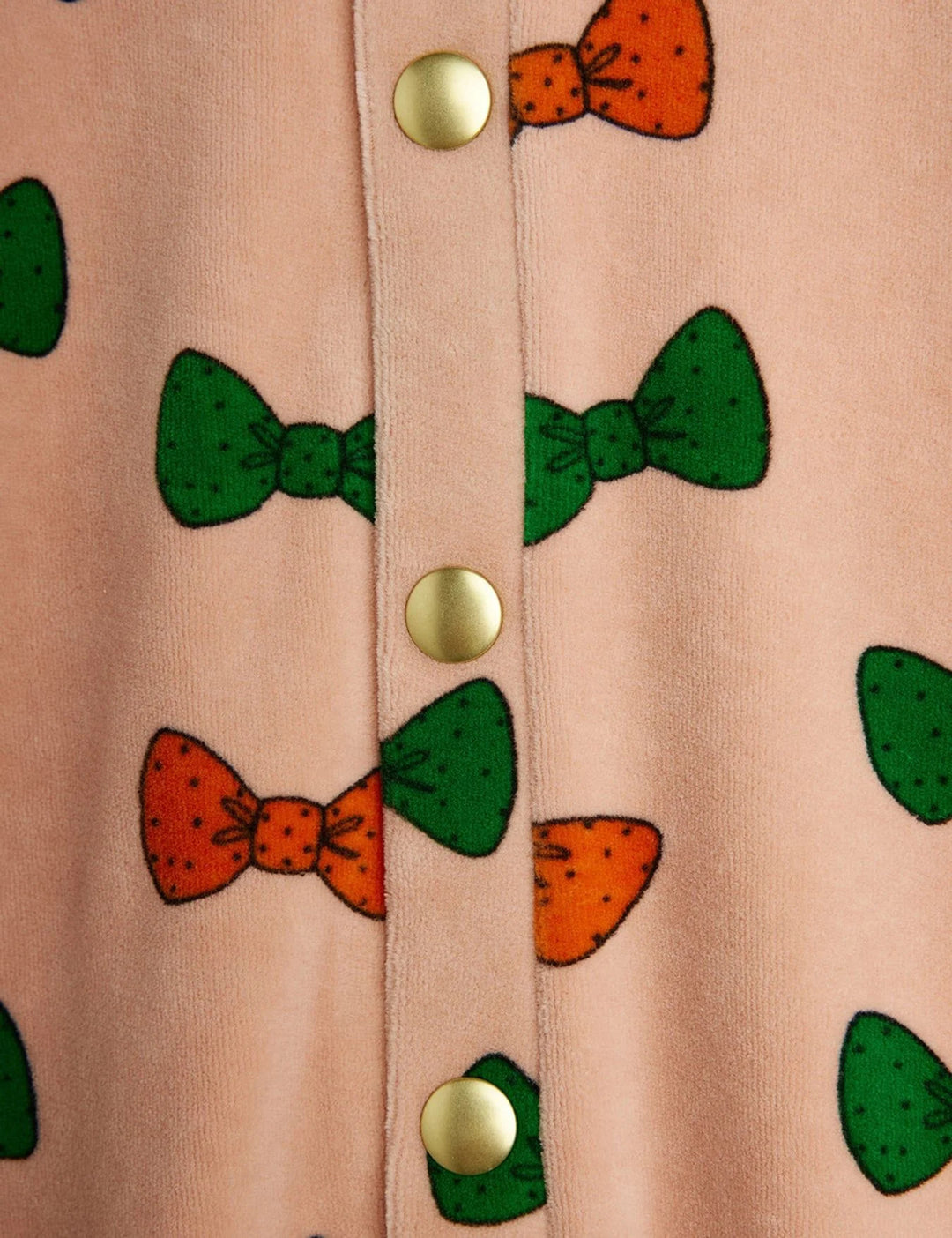 Detalj på Bows Velour Onesie med tryckknappar