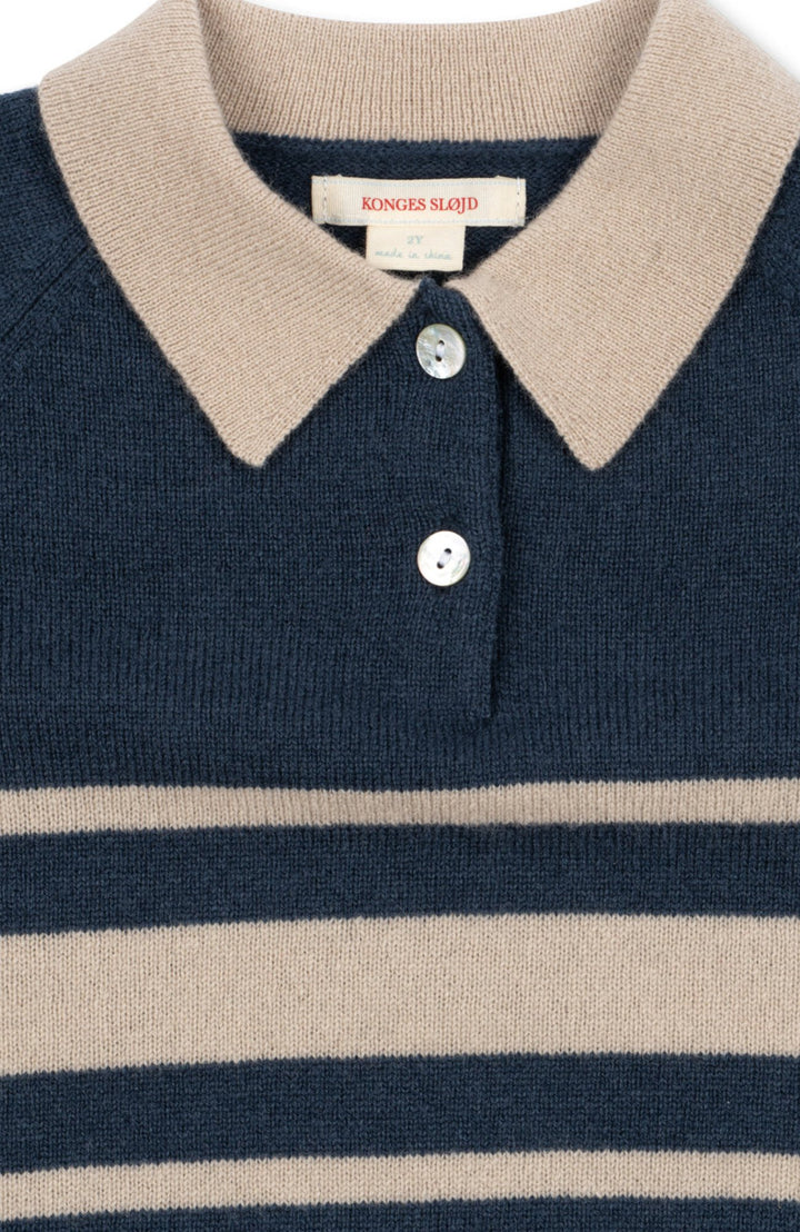 Krämvit krage med knappslå – Basi Polo
