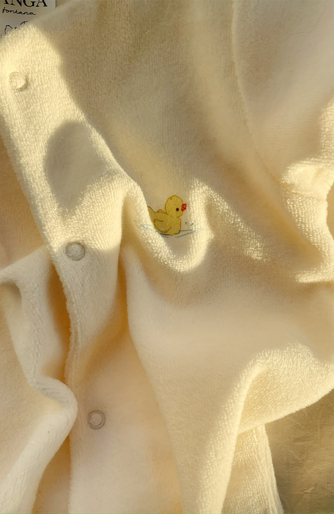 Elu Onesie - Antique White Fanga Fontana onesie